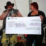 THE BIKER GUIDE donation to NABD. Photograph by Captain Smurf